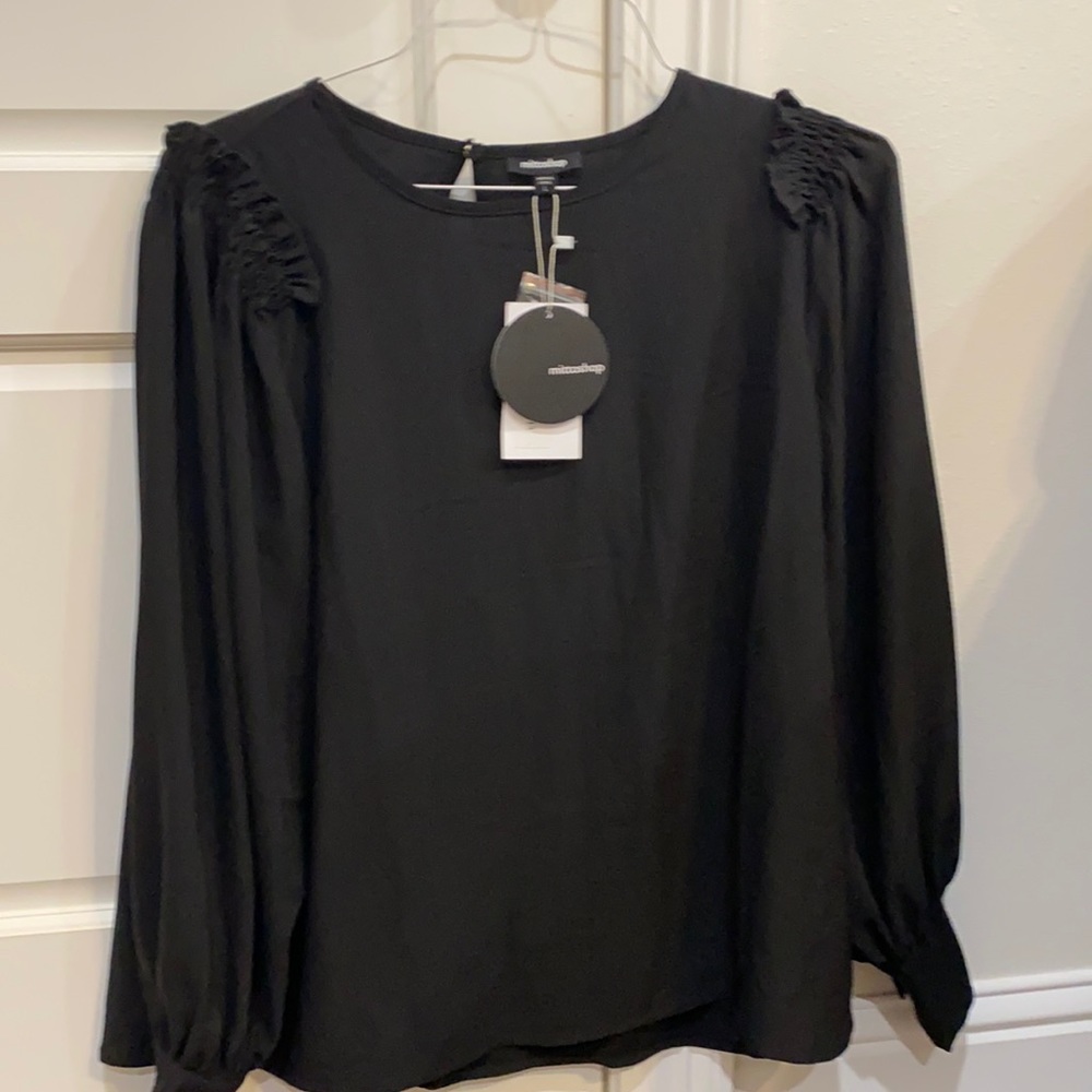 Brand New with tags long sleeve black blouse